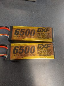 Two 4s lipo batteries with a golden label.